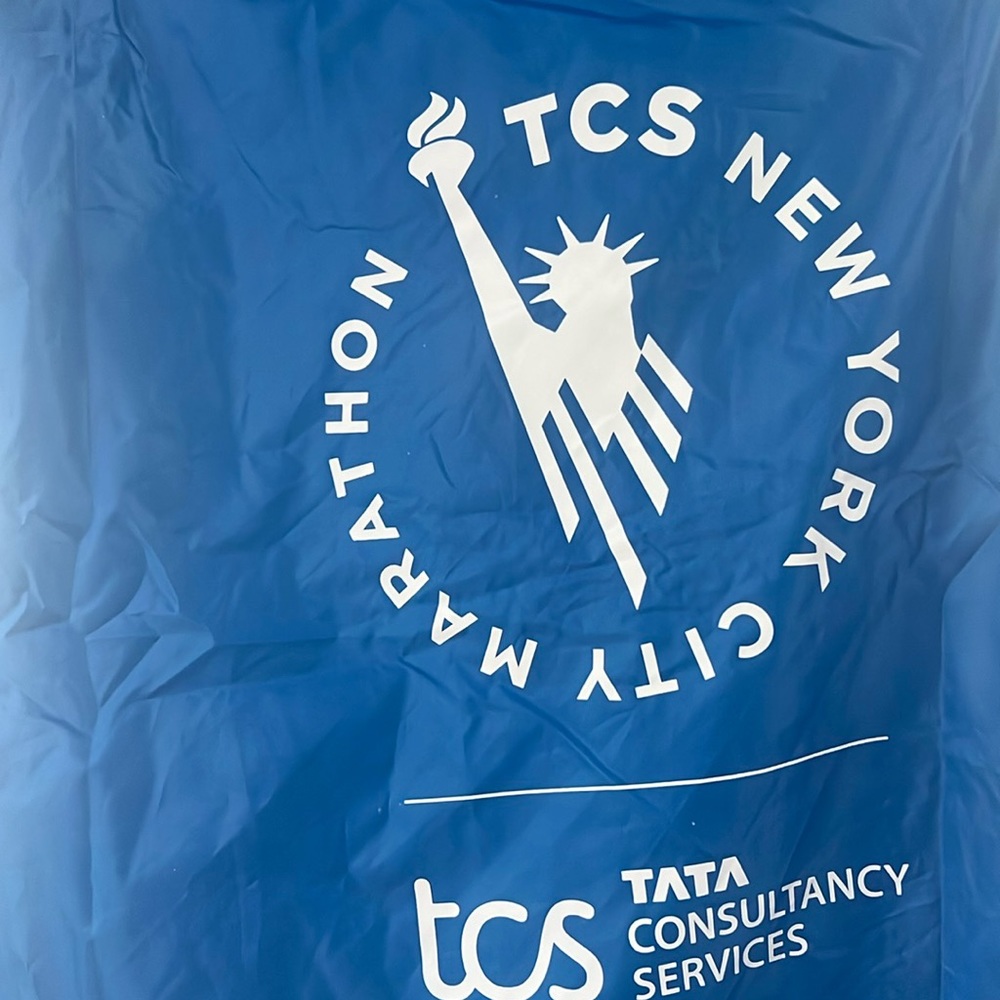 NYRR New York City Marathon Blue Poncho with white text